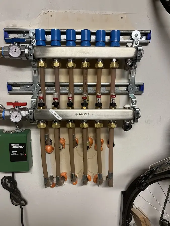 Plumber performing Water Heater Repair at a residential property in South St. Paul